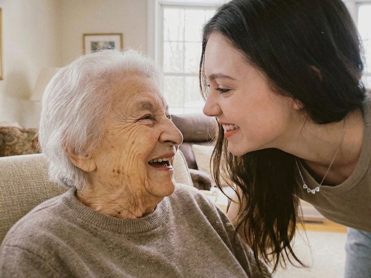 A grandmother laughing with her granddaughter